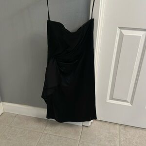 Black cocktail dress, strapless, measure 31 inches from bust size 2,